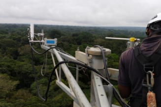Scientists monitor greenhouse gas exchanges from the top of the Congoflux Tower above the forest canopy, in Yangambi Biosphere Reserve, in the Congo Basin. 