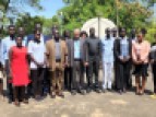 The Information commissioner (C), UNESCO Education Specialist ( C) and Public Information Officers pose for a group photo at  AMDISS, in Juba