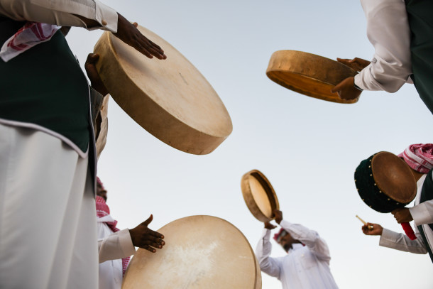 A group of men perform a traditional Saudi dance and song at the Janadria Festival.