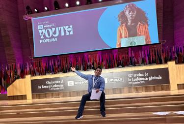Picture of Antonio Diaz Aranda on stage at the 13th UNESCO Youth Forum