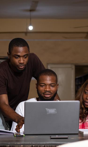 african students on laptop 